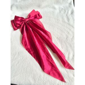 Bright red hair bow embellishment
